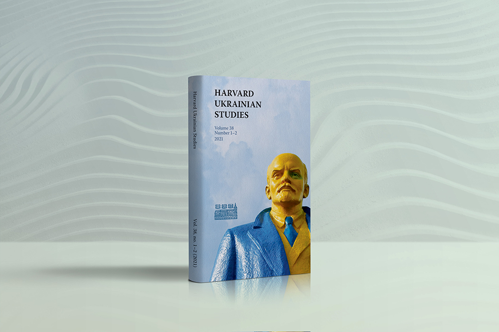 3D mockup of HUS issue showing photo of lenin statue painted blue and yellow