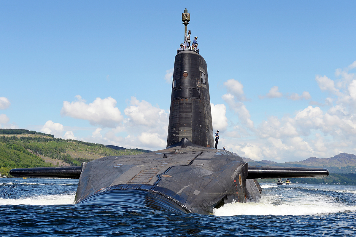 Royal Navy submarine HMS Victorious departs HMNB Clyde under the Scottish summer sunshine to conduct continuation training.