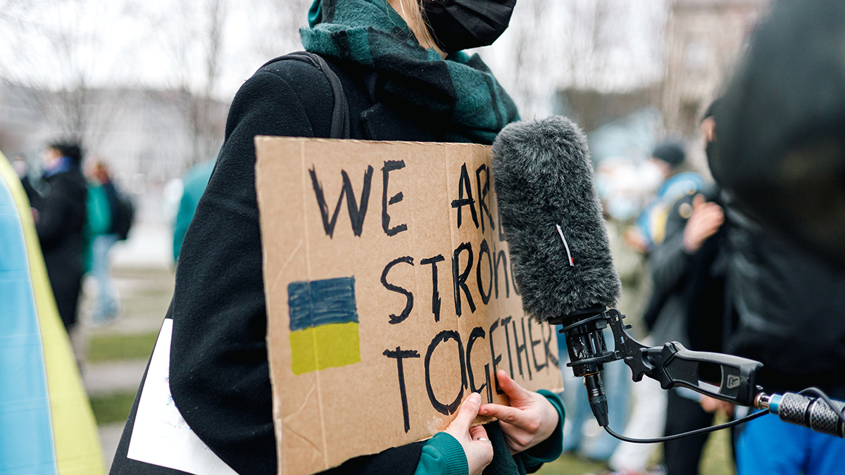 woman holding stop the war sign