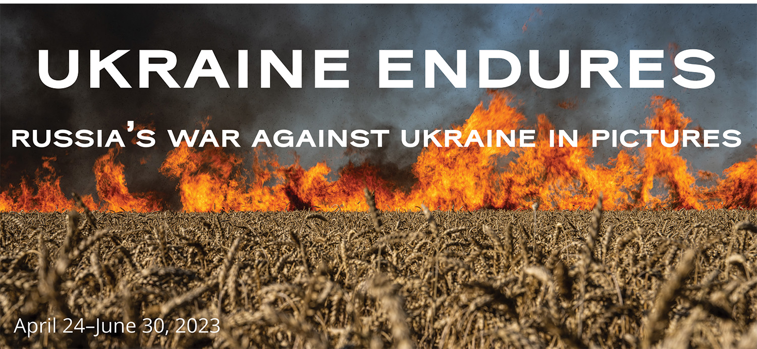 Ukraine Endures: Russia's War Against Ukraine in Pictures on top of Maloletka's image of a field burning due to Russian shelling in Kharkiv