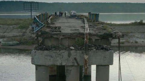 A destroyed bridge; poster for Intercepted film