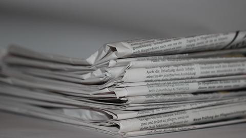 folded newspapers