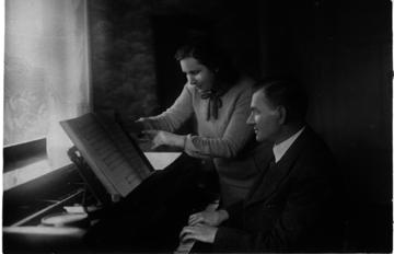 people at piano
