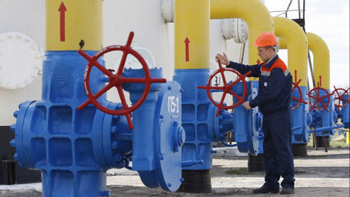 A Ukrainian worker checks gas valves of the main natural gas pipeline at the gas-compressor station in Boyarka village near Kiev, Ukraine, on April 22, 2015. STR/NurPhoto via Getty Images and CFR