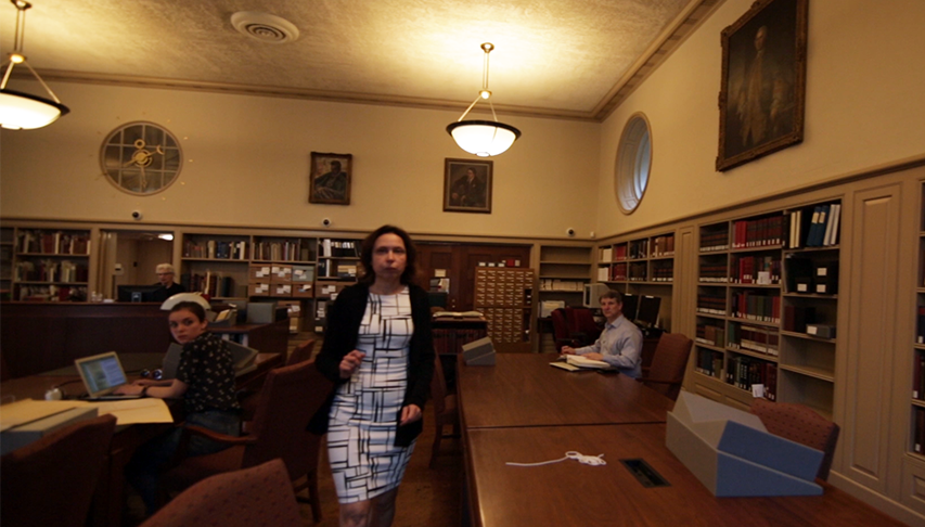 Olha Aleksic in library reading room