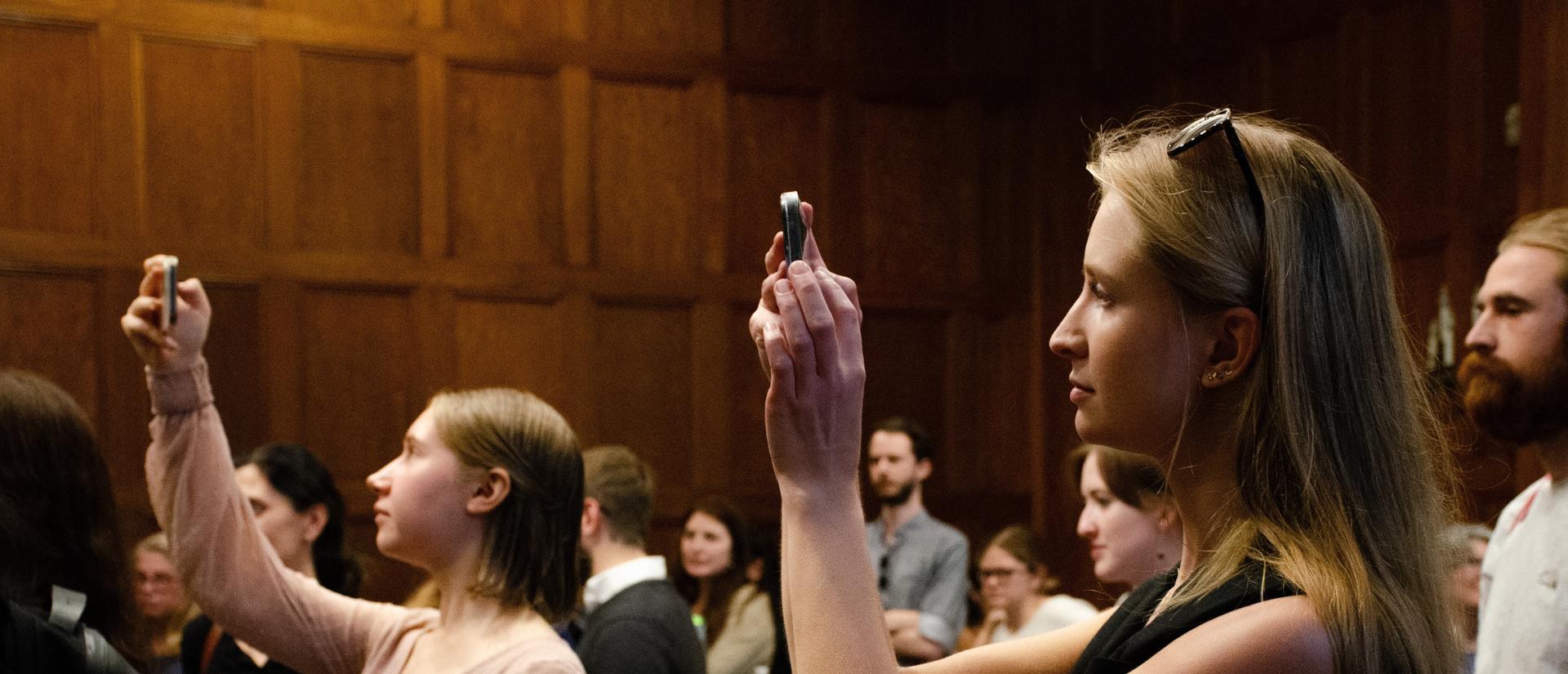 attendees recording an event