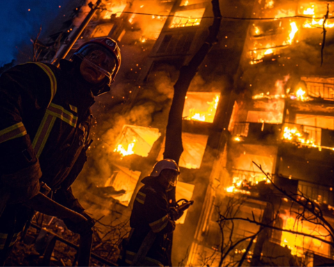 Fire burning in a Ukrainian residential building after a Russian missile strike