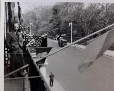 A man on the balcony with Ukrainian flag. Old photo.