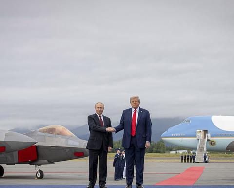 Trump and Putin shaking hands in Alaska